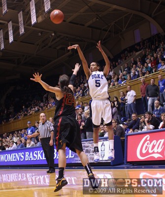 Jaz tries a trey from the corner -  - 