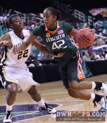 Shenise Johnson drives on Lekevia Boykin for two of her 15 points -  - 