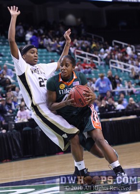 Miami gets another call, this time Secily Ray is whistled for the block as Shenise Johnson drives -  - 