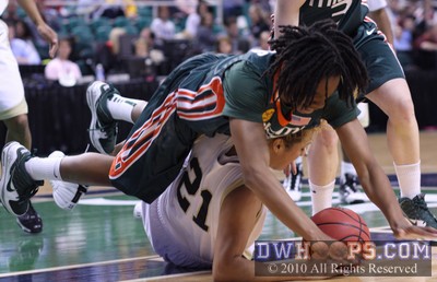 Diane Barnes dives over Sandra Garcia for a loose ball -  - 