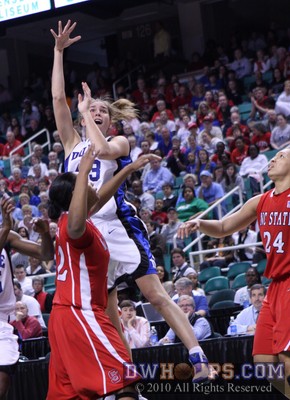 Allison Vernerey shoots over Bonae Holston early in the first half -  - 