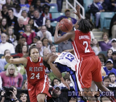 Duke's Karima Christmas falls through the air after fouling Nikitta Gartrell (2) -  - 
