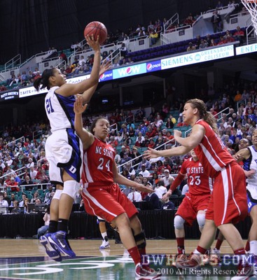 Joy Cheek is well guarded by Lucy Ellison (24) and misses this jump shot -  - 