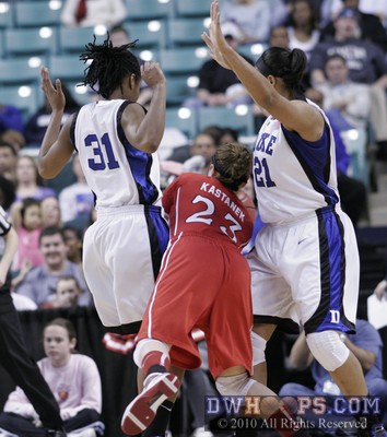 Marissa Kastanek tries to split the defense of Keturah Jackson and Joy Cheek.  Jackson was whistled for a foul. -  - 