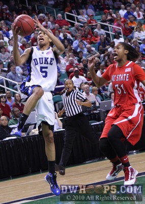 Sharnice Beal shouts at Jasmine Thomas on a fast break layup.  Duke scored 28 points off turnovers, but only six on fast breaks. -  - 
