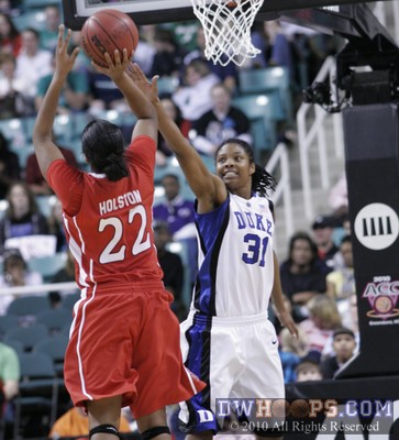 Bonae Holston hits a jumper from the free throw line over Keturah Jackson -  - 