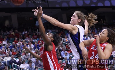 Nikitta Gartrell (left), Allison Vernerey, and Lucy Ellison watch a ball slapped out of bounds -  - 