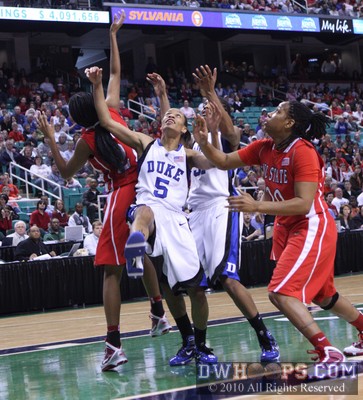 Jasmine Thomas looks up for an offensive rebound in the closing moments -  - 