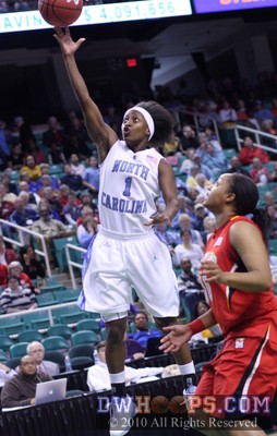She'La White scores on a fast break -  - 