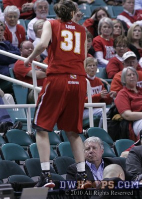 Lori Bjork jumped into the press area trying to snare a loose ball -  - 