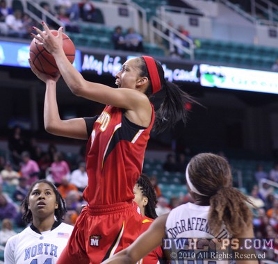 Jackie Narad attacks the basket -  - 