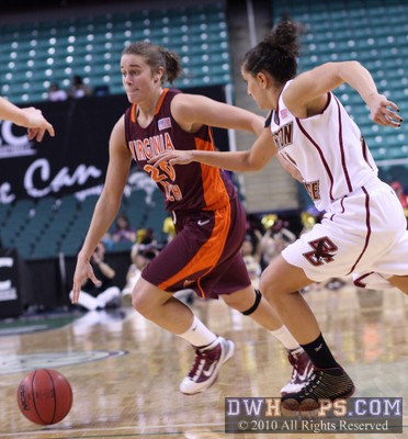 Lindsay Biggs puts the ball on the floor -  - 