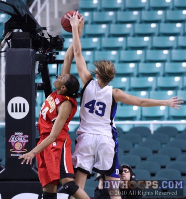 French National Team teammates Diandra Tchatchouang and Allison Vernerey (43) compete for a rebound -  - 