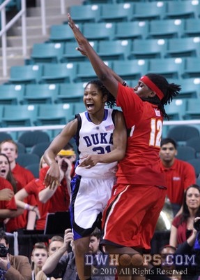 Keturah Jackson with Kizer hanging all over her -  - 