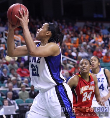 Joy Cheek with a key basket for Duke -  - 
