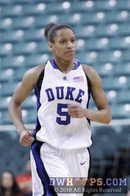 Jasmine Thomas is all business, hustling off the floor for a time out -  - 