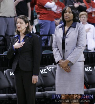 Duke Head Coach Joanne P. McCallie and assistant Trisha Stafford-Odom honor America during the National Anthem -  - 