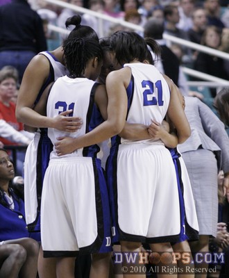 Duke's tight huddle before the opening tip -  - 