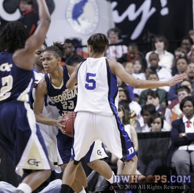 Duke's defense surrounds Deja Foster -  - 