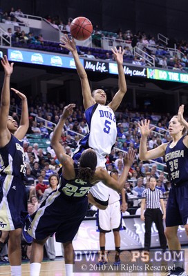Georgia Tech's Deja Foster (23) steps in to take a charge from Duke's Jasmine Thomas -  - 