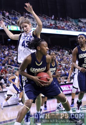 Chelsea Regins gathers in a rebound as Allison Vernerey comes over the top -  - 