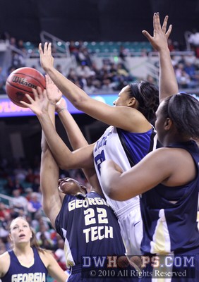 Alex Montgomery (22) forces Joy Cheek to lose control of the ball -  - 