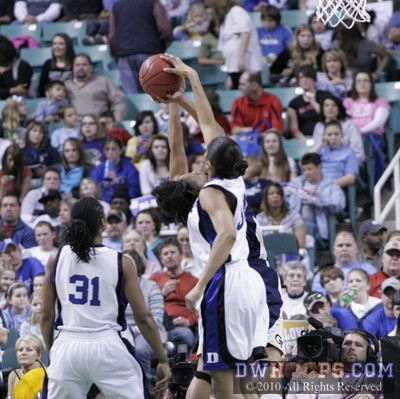 Krystal Thomas with a spectacular clean block of Sharena Taylor's layup -  - 