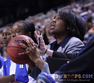 Duke assistant Trisha Stafford-Odom catches a wayward pass from Jasmine Thomas -  - 