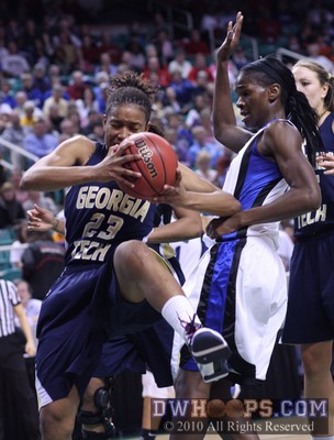 After grabbing a defensive rebound Deja Foster comes down awkwardly in the lane, putting her elbow into Duke's Bridgette Mitchell -  - 