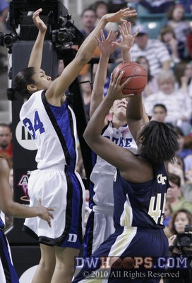 Georgia Tech's Sasha Goodlett sees nothing but outstretched Blue Devil hands as Krystal Thomas (left) and Allison Vernerey have her well guarded -  - 