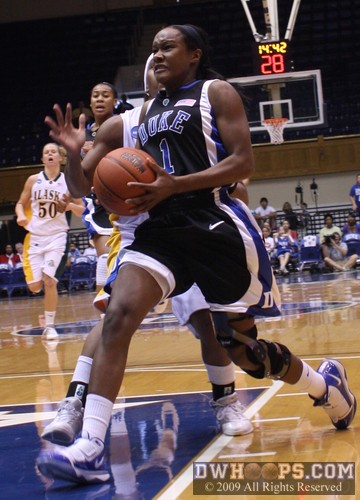Chelsea Hopkins goes strong to the basket, her layup broke a 10-10 tie. -  - 