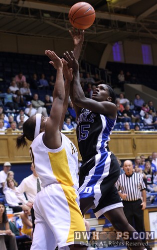 Bridgette Mitchell powers to the hoop and is fouled -  - 