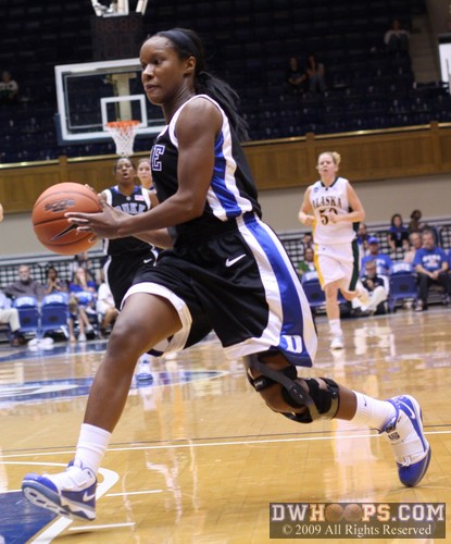 Chelsea Hopkins runs the break looking to pass -  - 