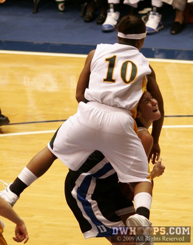 Kiki Taylor finds Allison Vernerey is only a ladder to the bench - it's her fifth foul -  - 