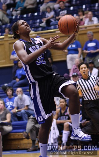 Freshman Alexis Rogers goes to the hoop in spectacular fashion -  - 