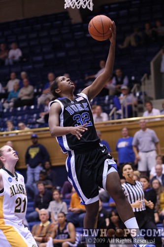 Freshman Alexis Rogers goes to the hoop in spectacular fashion -  - 