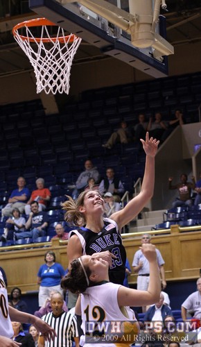 Allison Vernerey is fouled with 13 seconds left, her hoop and free throw put Duke at the century mark. -  - 