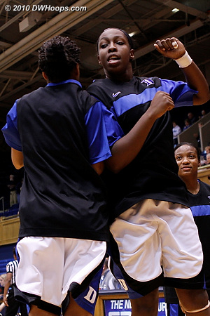 Chloe Wells with a hip bump for starter Chelsea Gray in pregame introductions