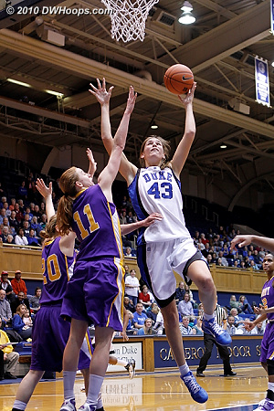 Allison Vernerey tries a left handed shot against Julie Forster.