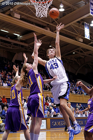 Allison Vernerey tries a left handed shot against Julie Forster.