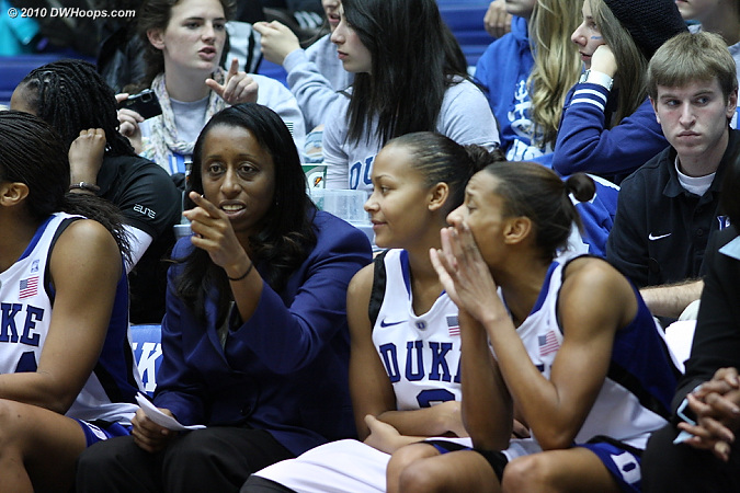 Coach Williams points out a play to Shay Selby.