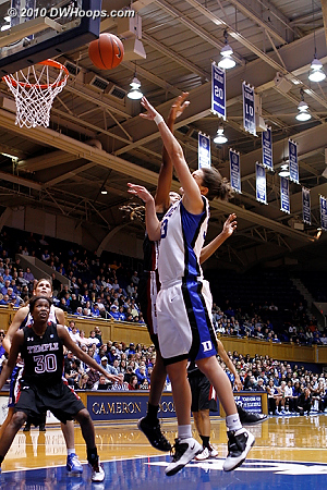 Haley Peters scores in the paint and draws a foul.
