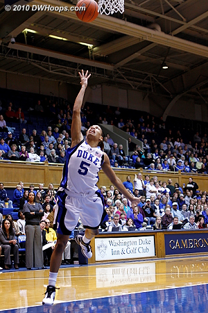 Jasmine Thomas finishes a layup attempt.