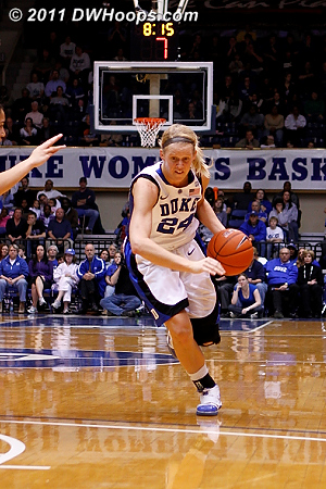 With the shot clock ticking down, Kathleen Scheer drives.  Unfortunately she'd be called for an offensive foul moments after a nifty pass.