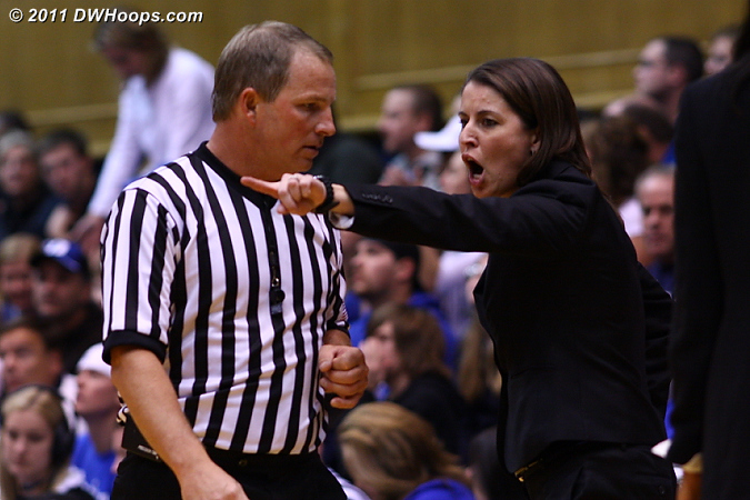 Coach P gives official Mark Zentz her opinion on a call at Duke's end.  - Duke Tags: Joanne P. McCallie 