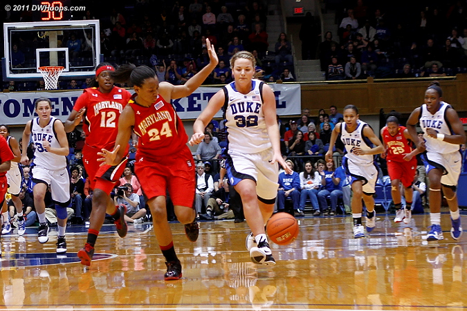 Tricia Liston leads the Duke fast break as Diandra Tchatchouang gives chase.  - Duke Tags: #32 Tricia Liston 