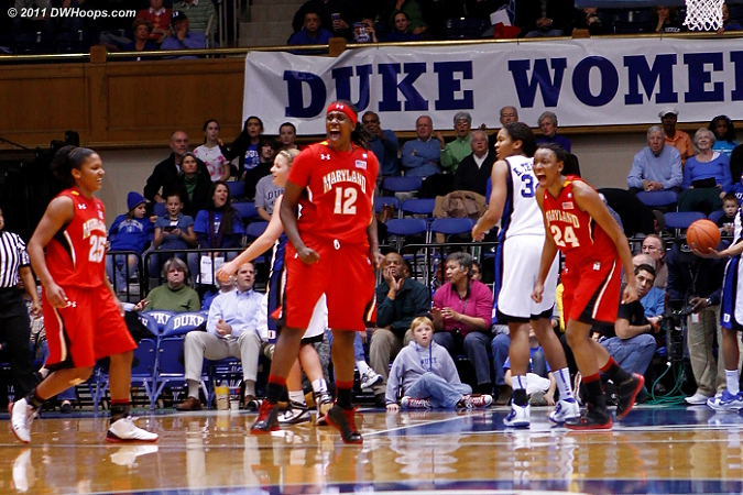 Thomas, Kizer, and Tchatchouang celebrate Kizer's buzzer beater.
'  