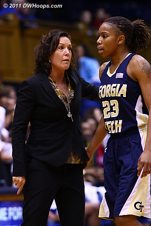 Georgia Tech Head Coach MaChelle Joseph seeks an explanation from Deja Foster after one of Tech's three shot clock violations.  