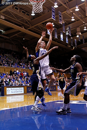 Allison Vernerey goes strong to the hoop, she would miss, get the board, and ultimately be fouled on the stickback try.  - Duke Tags: #43 Allison Vernerey 