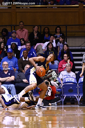 An early second half turning point was Alex Montgomery picking up her third and fourth fouls.  Here Karima Christmas draws Alex's third.  - Duke Tags: #13 Karima Christmas 